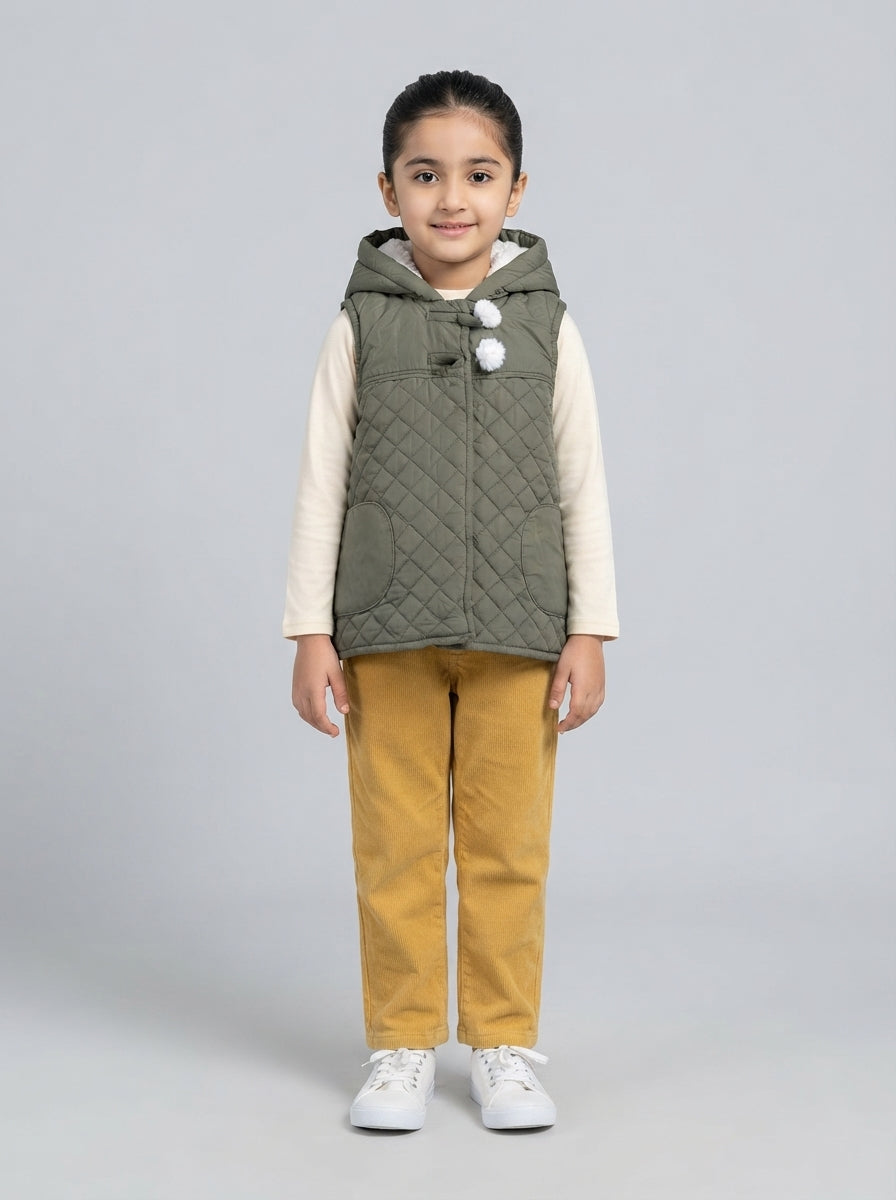 Preloved Aspen girls' gilet / vest, size 3-4Y, worn by a model, styled