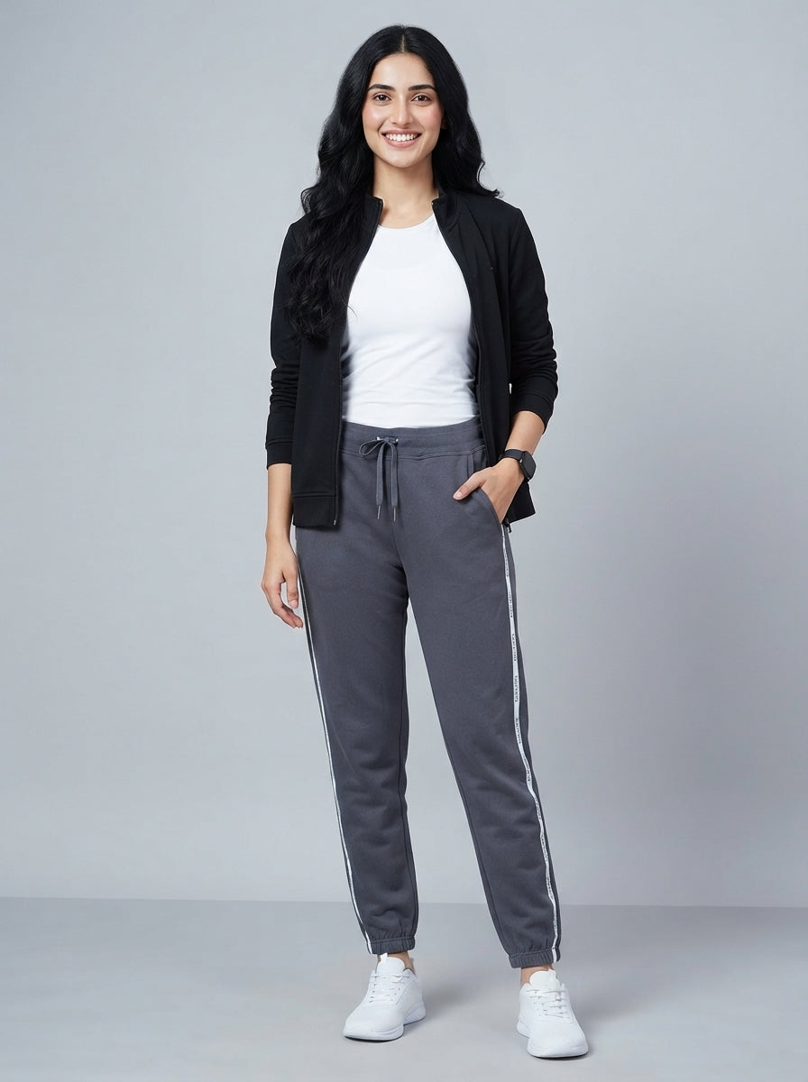 Preloved Calvin Klein women's sports trouser, size L, worn by a model, styled