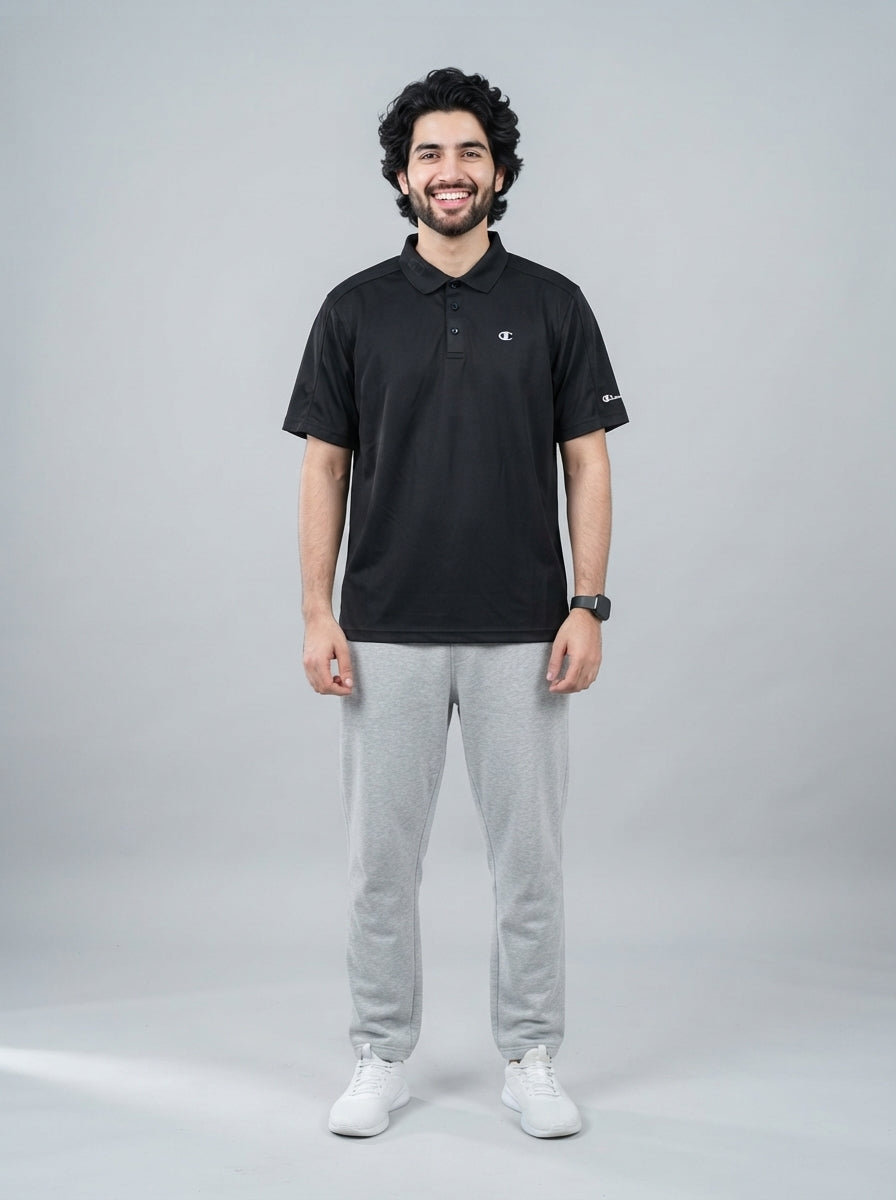 Preloved Champion men's sports polo, size L, worn by a model, styled