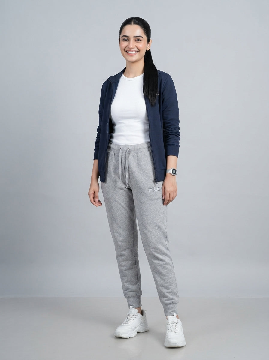 Preloved FILA women's sports trouser, size M, worn by a model, styled