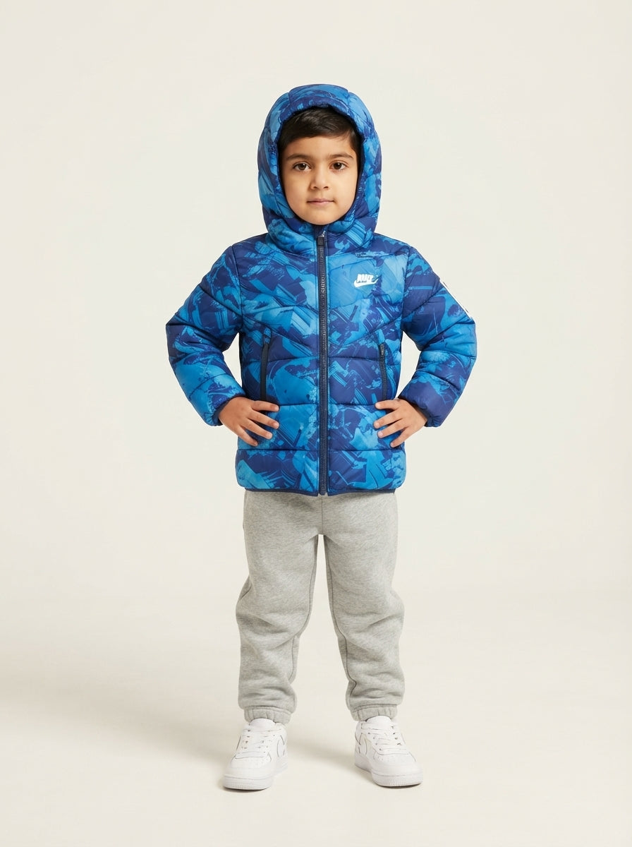 Preloved Nike boys' puffer jacket, size 2–3 Y, worn by a model, styled