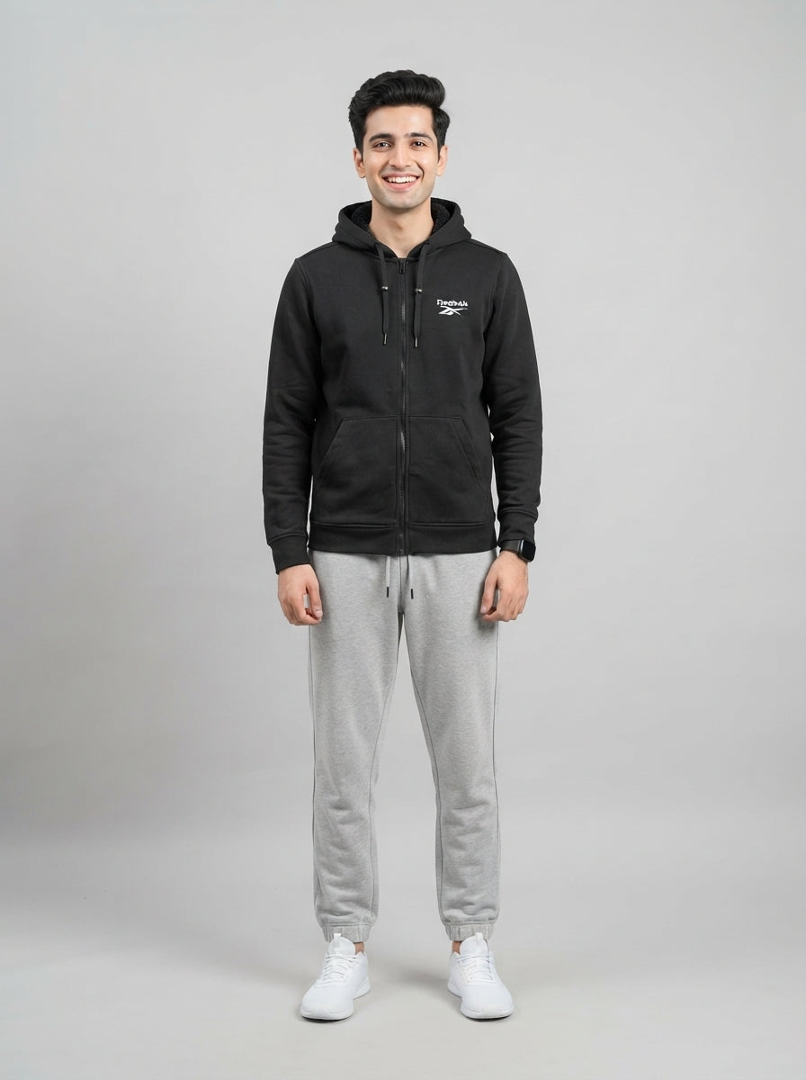 Preloved Reebok men's sports hoodie, size M, worn by a model, styled