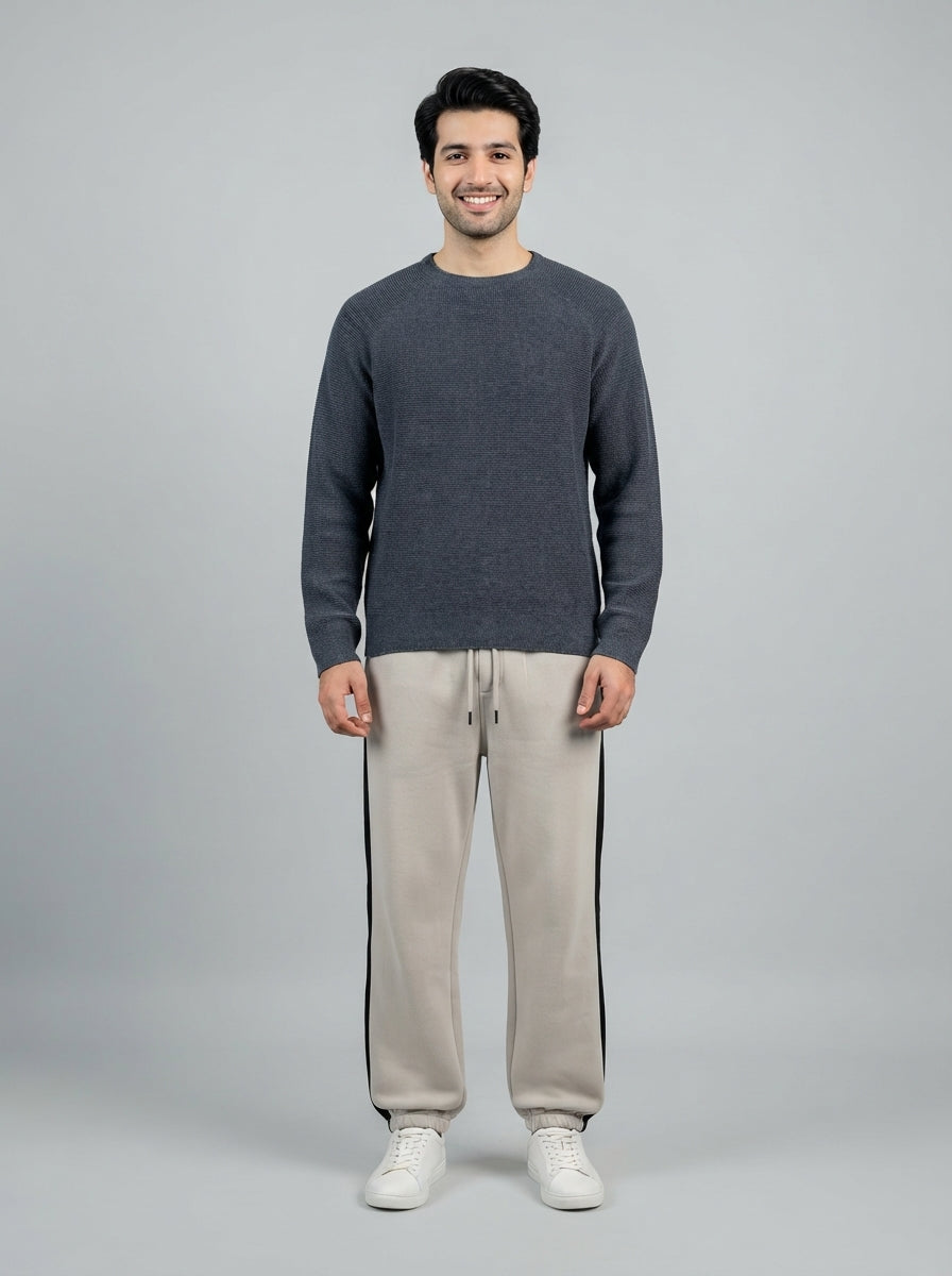 Preloved Uniqlo men's sweater, size L, worn by a model, styled