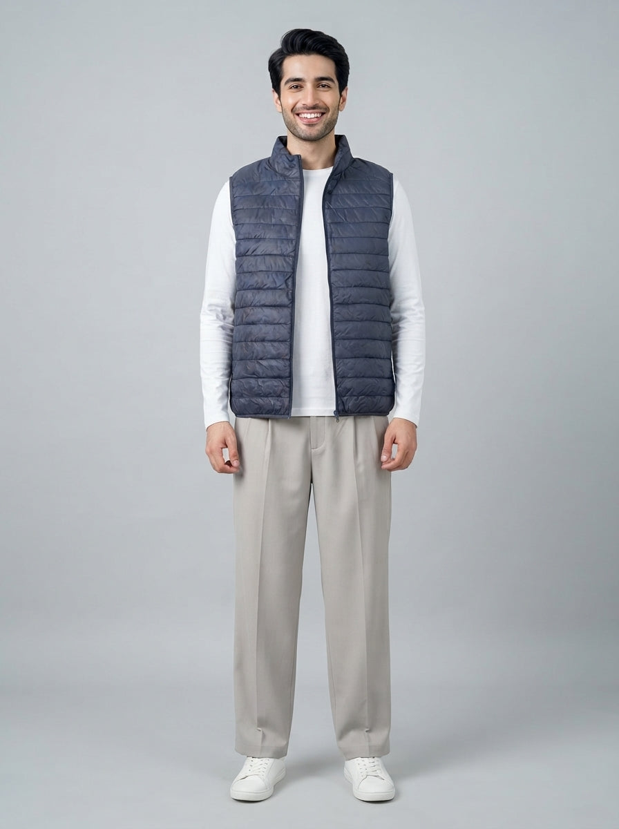 Preloved Uniqlo men's gilet / vest, size M, worn by a model, styled