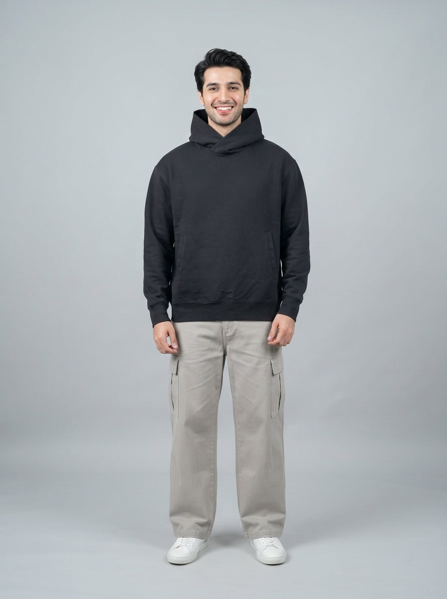 Preloved Uniqlo men's hoodie, size L, worn by a model, styled