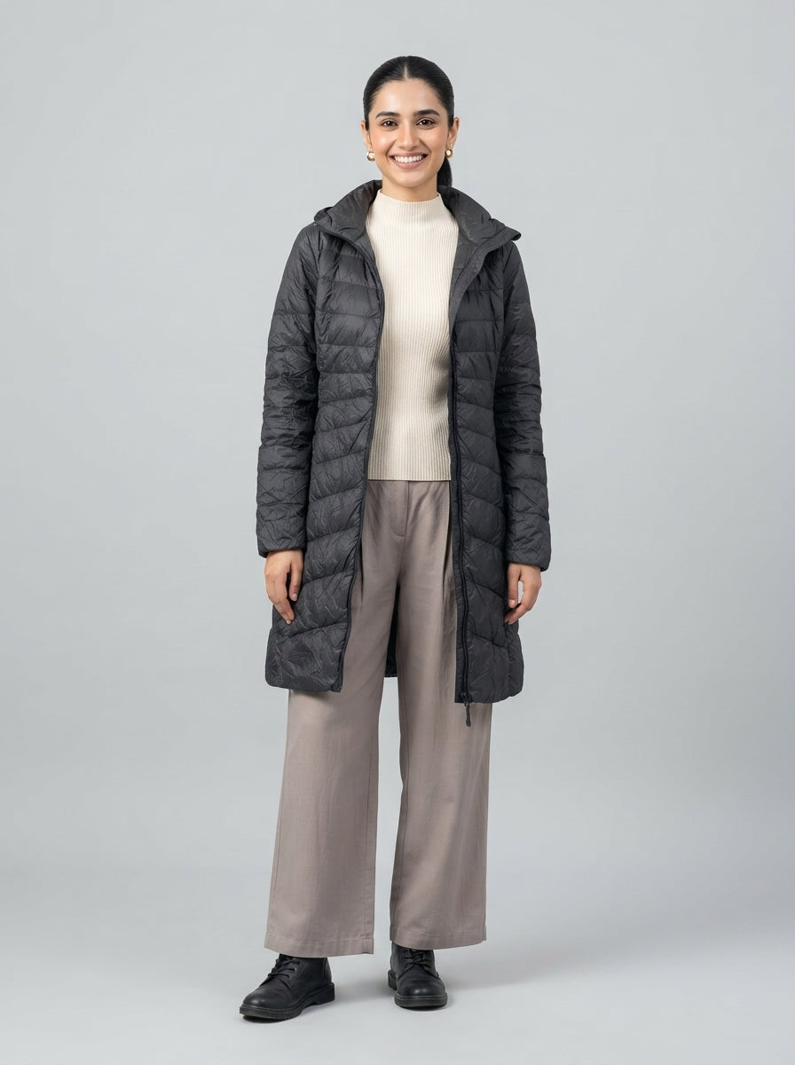Preloved Uniqlo women's parka, size S, worn by a model, styled