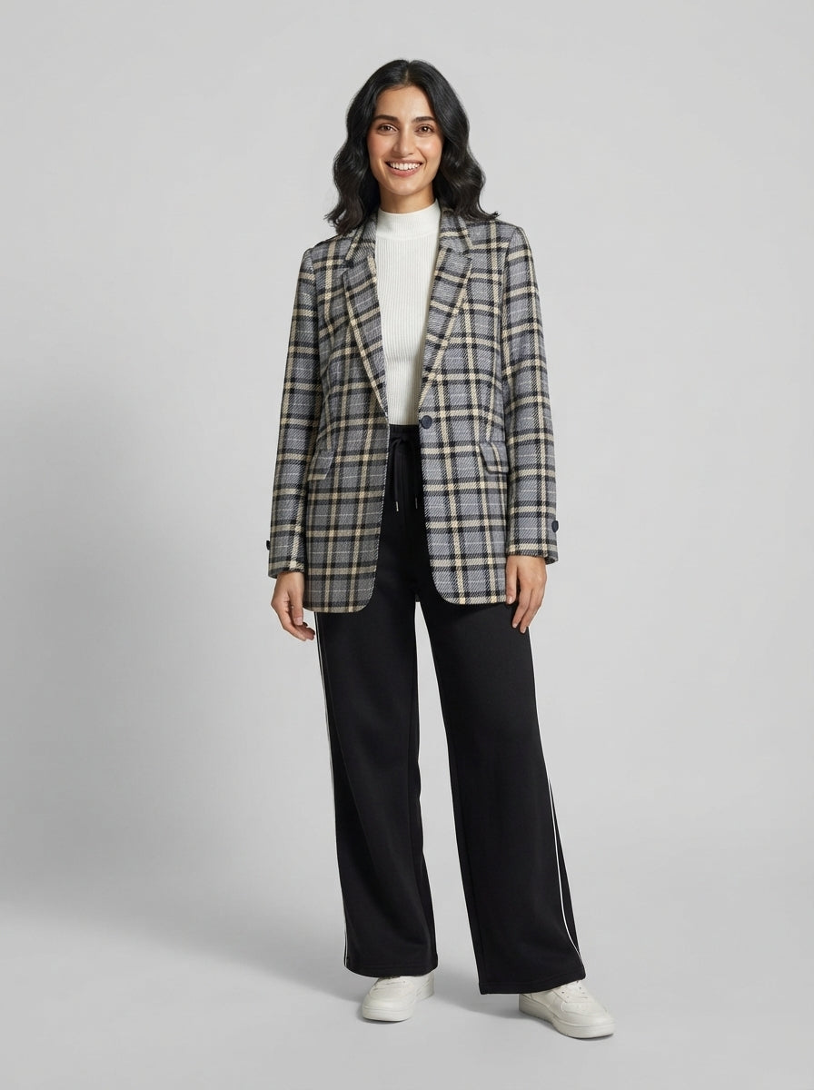 Preloved Uniqlo women's blazer, size L, worn by a model, styled