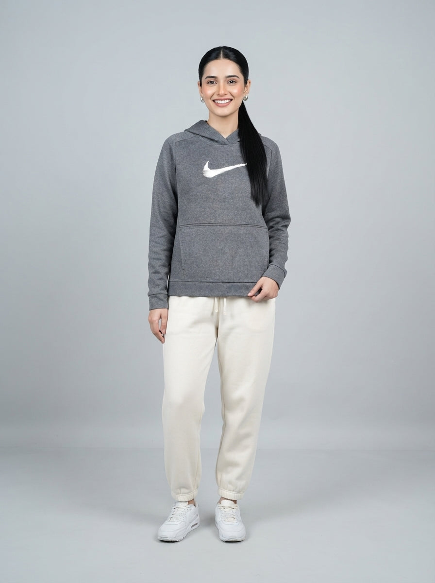 Preloved Nike women's sports hoodie, size L, worn by a model, styled