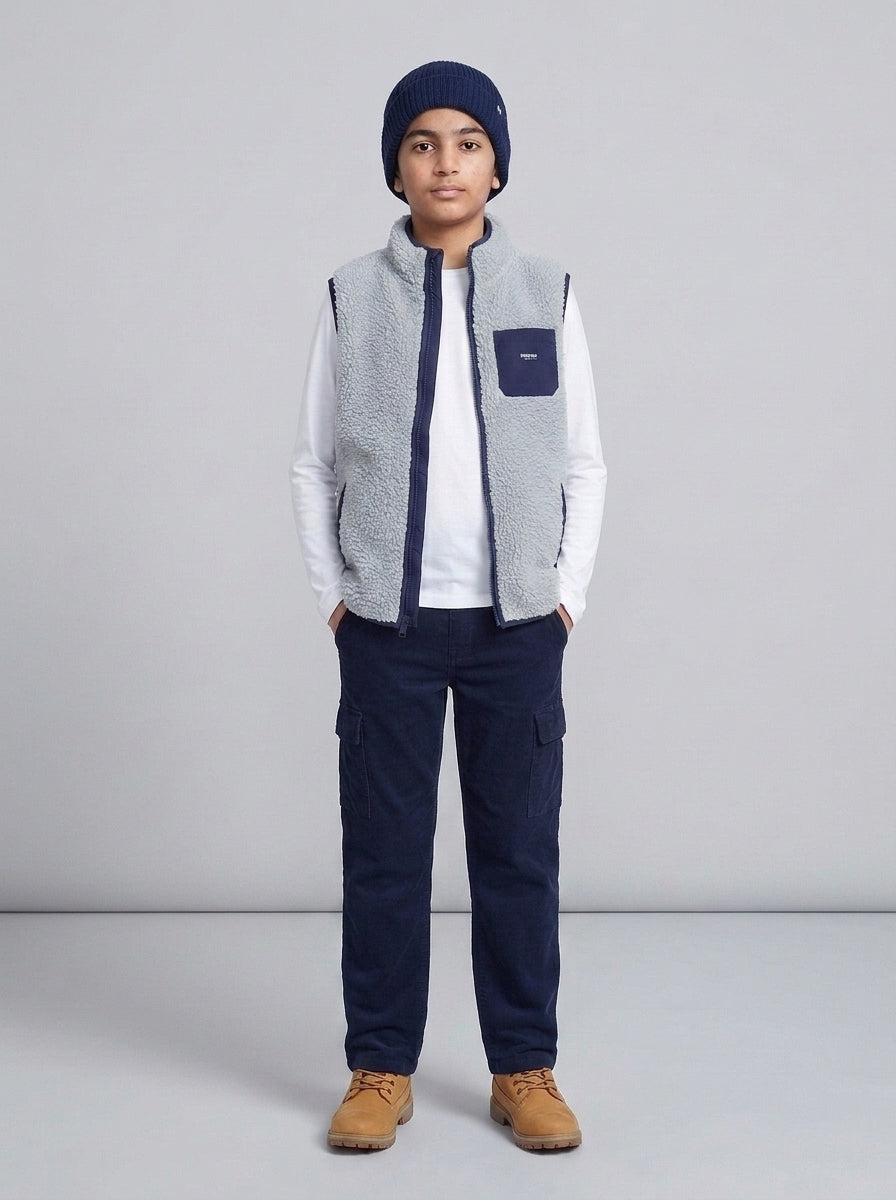 Preloved OshKosh B'gosh teen boys' gilet / vest, size 10-12Y, worn by a model, styled
