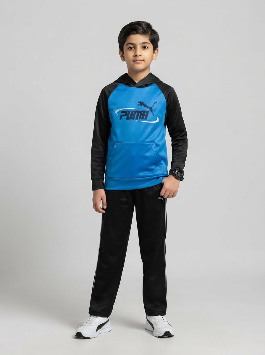 Preloved Puma boys' sports hoodie, size 6-8Y, worn by a model, styled
