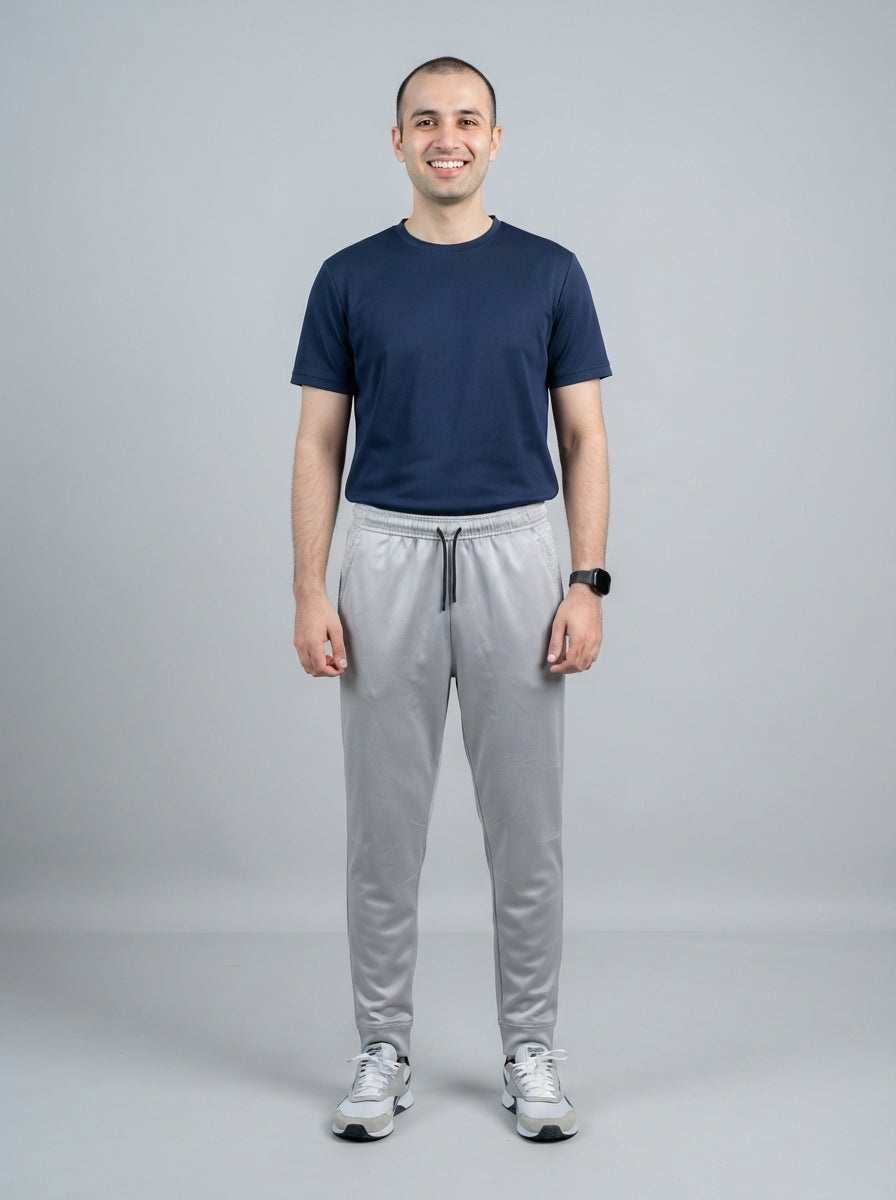 Preloved Reebok men's sports trouser, size 30, worn by a model, styled