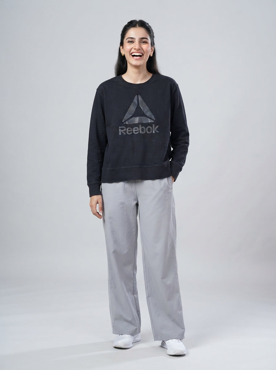 Preloved Reebok women's sports sweatshirt, size XL, worn by a model, styled