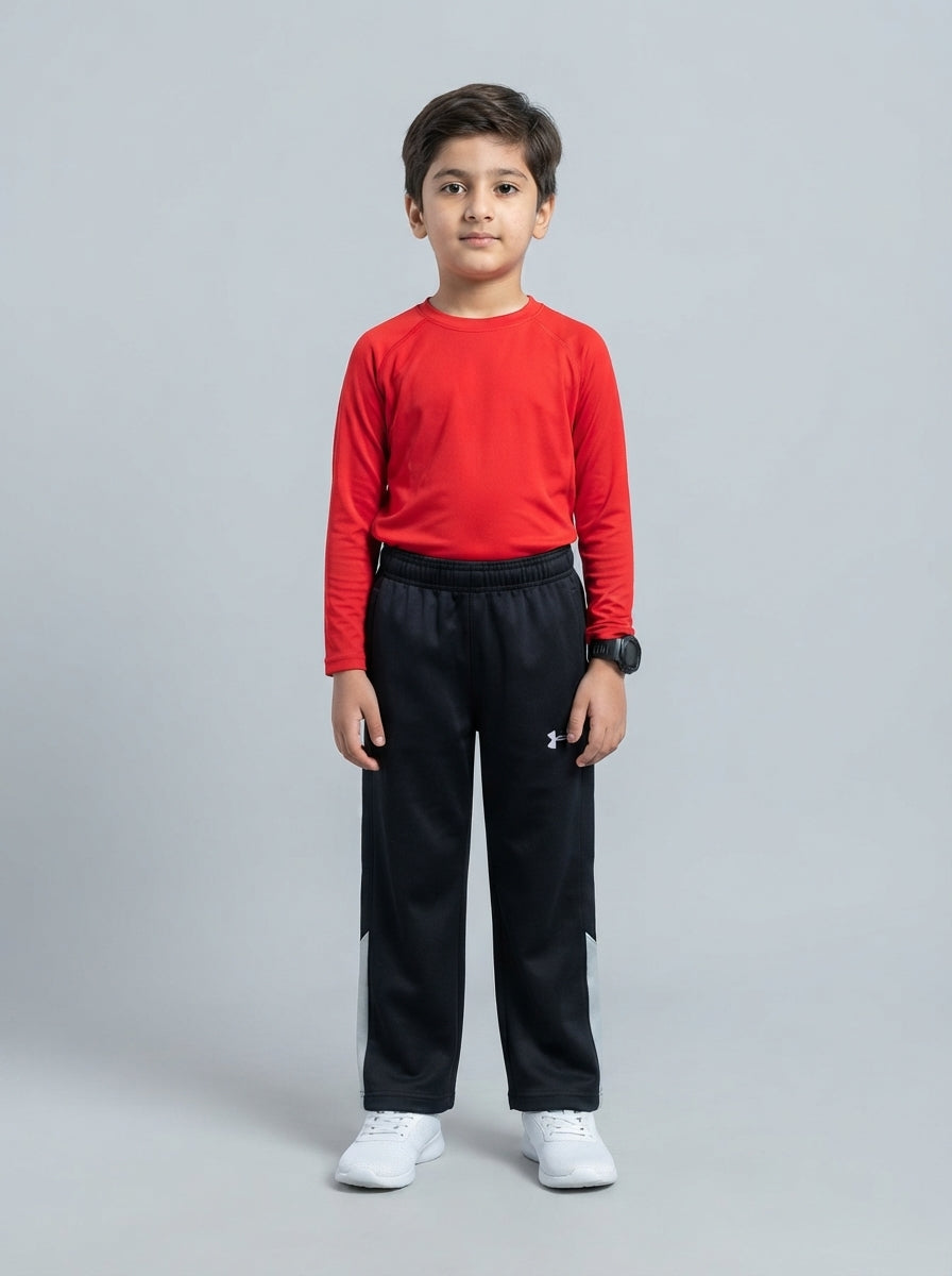 Preloved Under Armour toddler boys' trousers, size 4-5Y, worn by a model, styled