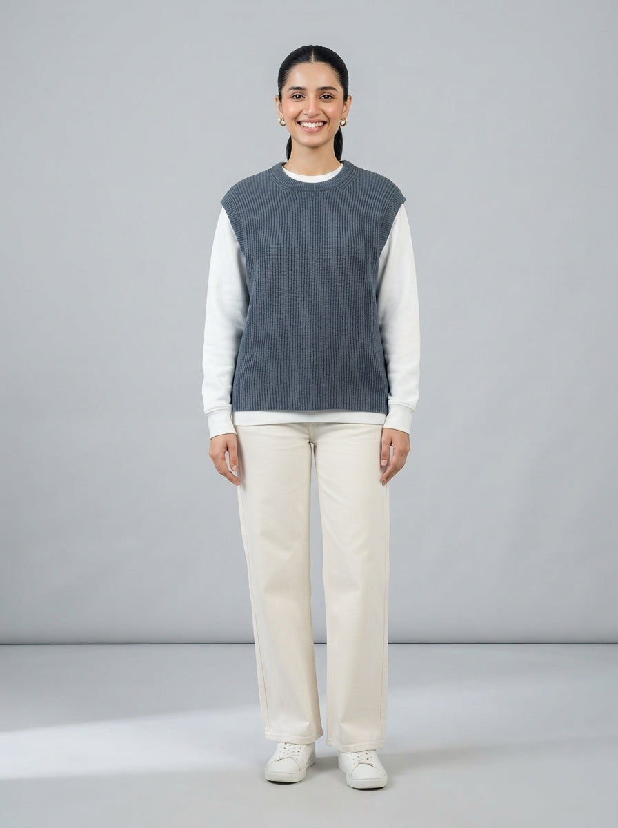 Preloved Uniqlo women's sweater, size M, worn by a model, styled