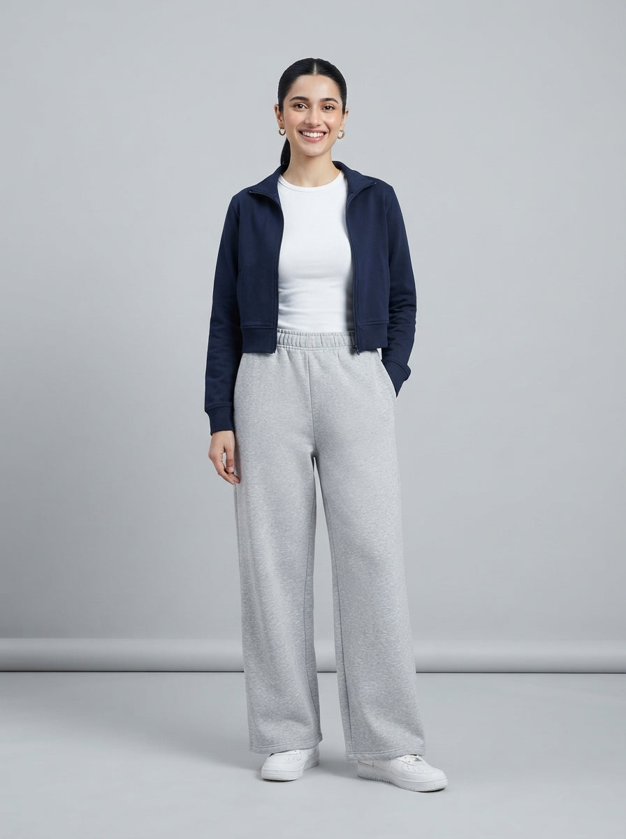 Preloved Uniqlo women's casual trouser, size M, worn by a model, styled