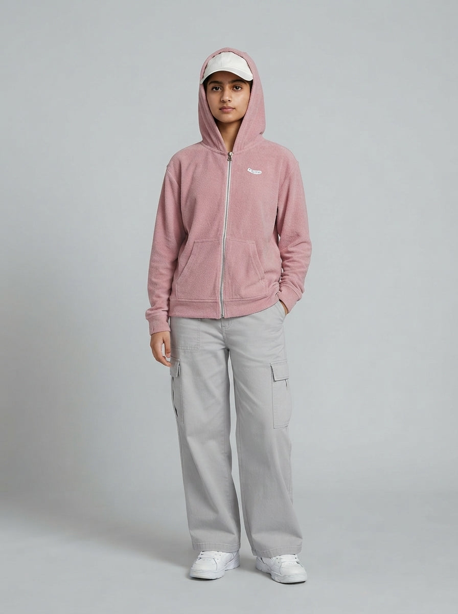 Preloved Volcom teen girls' zip-up hoodie, size 14-16Y, worn by a model, styled